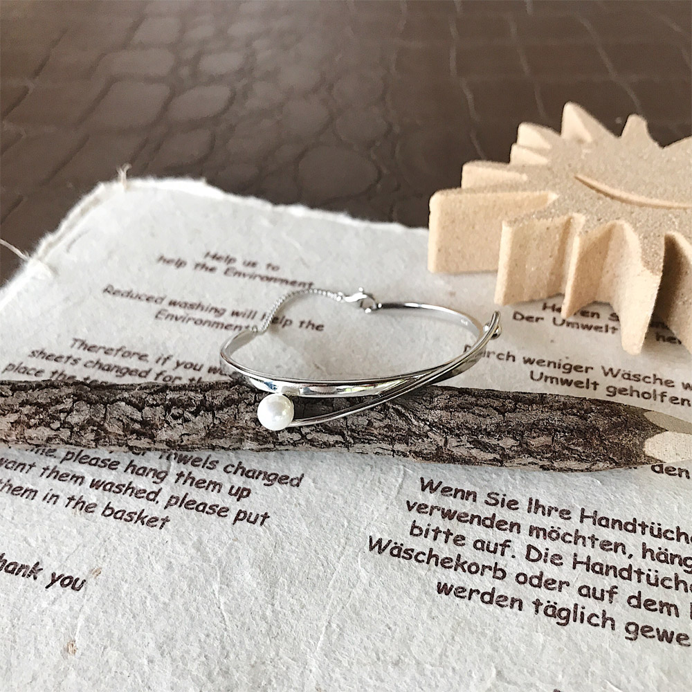 D005交叉珍珠手镯